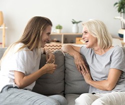 Ladies converse on couch