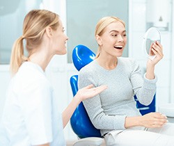 A cosmetic dentist in Coppell answering a patient’s questions