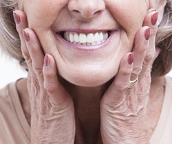older lady smiling with dentures