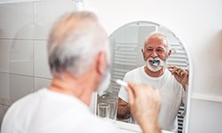 Man brushing teeth in Coppell